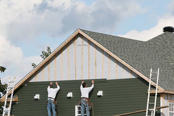 Professional Siding technician working in Crabtree, PA